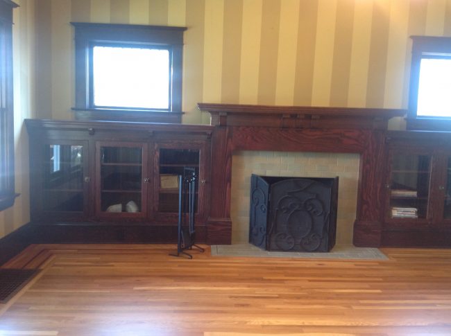 BEFORE: Newly-remodeled fireplace wall in place. Needs furnishings! 